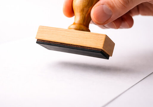 Hand Holding Wooden Rubber Stamp