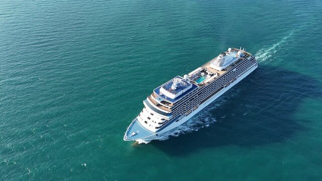 Aerial view of beautiful white cruise ship above luxury cruise in the ocean sea at early in the morning time concept smart tourism travel on holiday vacation time on summer,