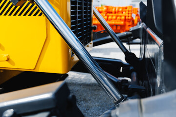 Heavy machinery close-up in mining industry equipment yard