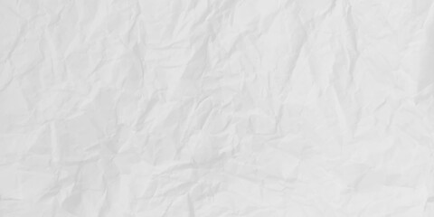 Naklejka premium Close-up macro of crumpled white paper texture,Macro Shot Showcases The Texture Of Crumpled White Paper Highlighting Light