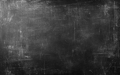 Black Blackboard Chalkboard texture. Empty blank dark dirty school board wall banner background backdrop with traces of chalk for text.