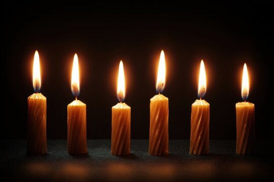 Six lit candles on a dark backdrop Holocaust Remembrance Day January 27