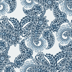 Boho-style vector seamless paisley pattern with flowers, great for fashion, wrapping paper, and home decor