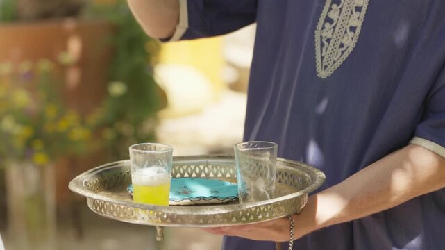 Assilah, Morocco, old Medina, riad, fountain, courtyard, Moroccan architecture, traditional design, water feature, zoom in, walk in shot, travel, cultural heritage, historic interior