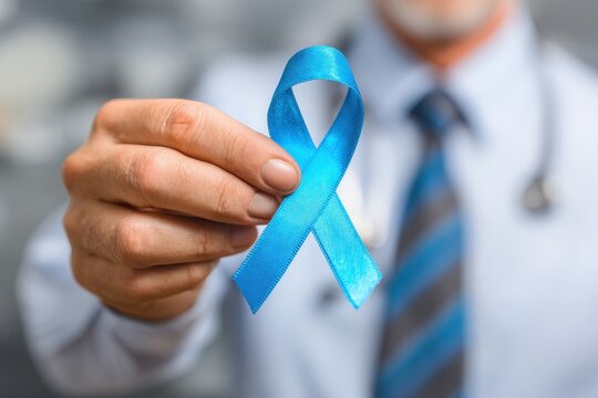 Prostate cancer awareness Doctor holding blue ribbon Male support for charity and care Medical oncology symbol Help for carcinoma and achalasia Middle aged individual