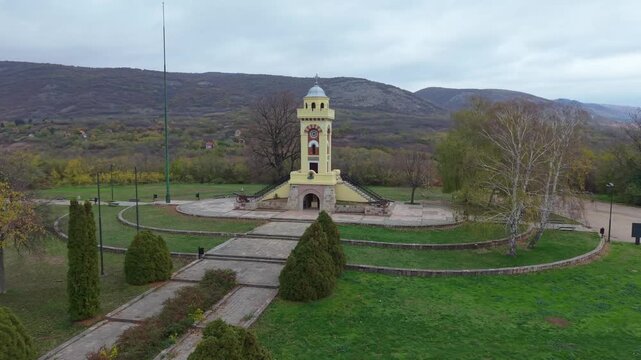 An orbiting drone shot around the Čegar Monument in Ni&scaron;, Serbia, highlighting the historic memorial, surrounding landscape, and its importance in Serbian national heritage.
