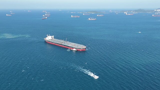 Oil tanker ship. Red Oil Tanker runing in the ocean sea. petroleum ship transportation import export fuel energy across red ocean sea. Vessel transport Gas to customs	
