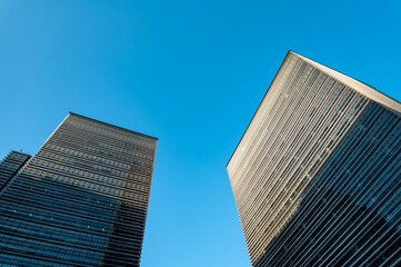 Looking up at modern commercial skyscrapers in Shanghai