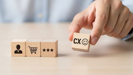 Naklejka premium Hand arranging wooden blocks with customer experience icons