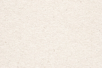 A sheet of beige recycled cardboard texture as background