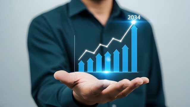 Businessman holding a virtual graph showing growth and future projection for the year 2034