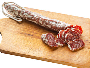 sliced ​​dried sausage on a wooden board