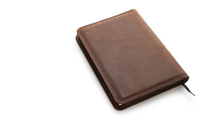 notebook in a brown cover on a white isolated background