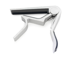 Guitar capo close-up on a white isolated background