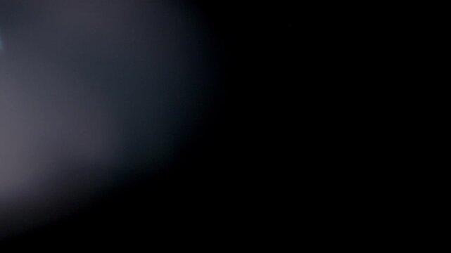 Lens flash, abstract strobe lights moving. Light leak glass reflection, crystal, defocused, colorful rainbow light leak, rays of light on black background