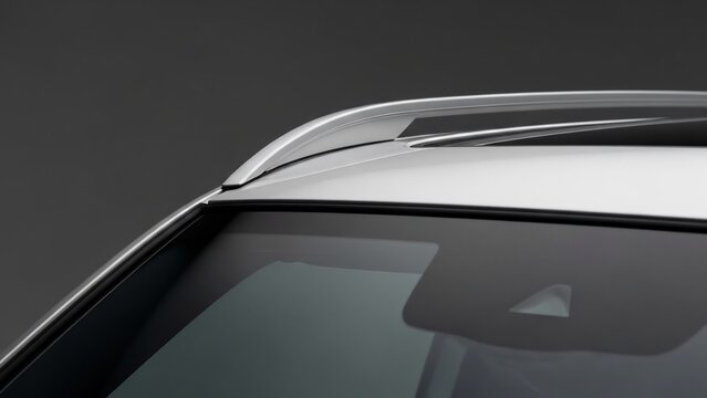 Close-up of car roof and window.