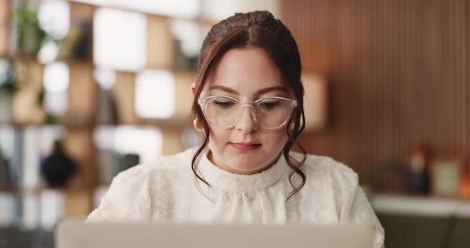 Laptop, reading and business woman with glasses in office for vision, article or proofreading. Computer, eyewear and journalist in workplace to review news, fact check or information with research