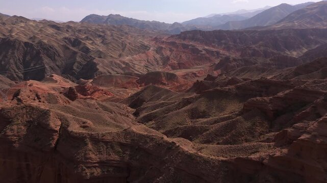 Red sandstone canyon landscape Kyrgyzstan aerial view