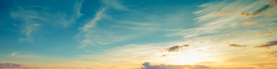 Sunset with the beautiful blazing sky. Horizontal banner