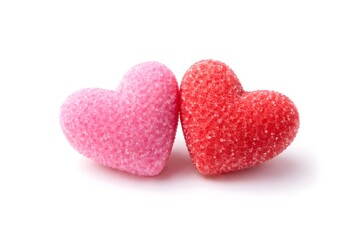 Obraz premium Two red and pink hearts side by side on a plain white background, symbolizing love and affection internation kissing day celebrate. 
