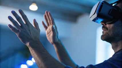A person using virtual reality technology, interacting with digital elements in a modern, immersive environment.