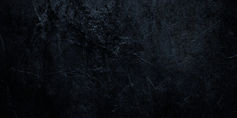 Obraz premium Dramatic dark wall concrete texture with heavy scratches weathered grit deep scratches, scuffs, and a weathered concrete appearance.