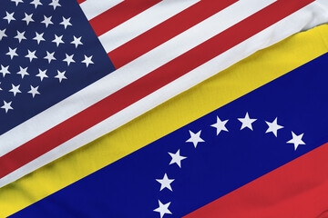 Venezuela and United States two flags together relations and conflict textile in cloth fabric texture