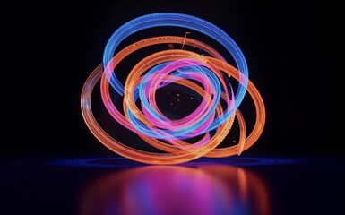 Vibrant light trails swirl in concentric circles against a dark background, creating dynamic motion.