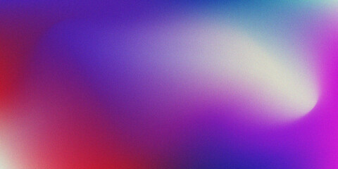 Abstract blurred background with vibrant gradients of purple red and a bright white spot
