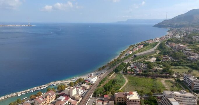Aerial view of the narrowest point of the Strait of Messina, in southern Italy. This sea channel lies between Capo Peloro near Messina, Sicily, and Torre Cavallo, near Villa San Giovanni, Calabria.