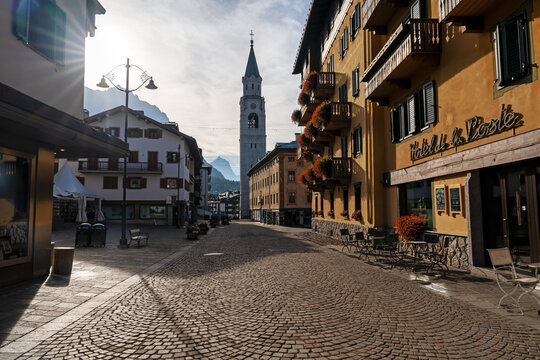 Cortina d'ampezzo, Belluno, Italy - September 27, 2023: View of Basilica Minore dei Santi Filippo e Giacomo church bell tower in Cortina d'ampezzo town.