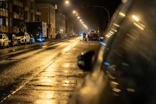 People setting off fireworks on a street in Germany amid debate over private fireworks ban
