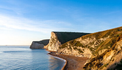 Durdle Door sea arch at sunset Dorset England