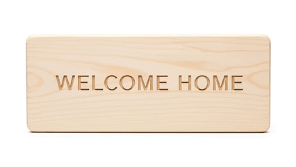 Obraz premium A light-colored rectangular wooden sign with rounded corners, featuring the words 'WELCOME HOME' debossed into its surface, isolated on a white background.