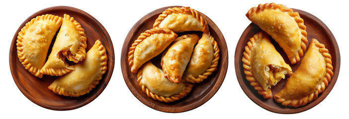 Fried baked pastry empanadas filled with ground beef cheese ham and crimped edges on wooden plate, isolated on white background