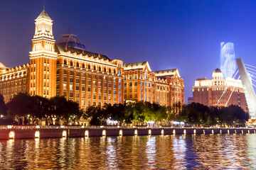 Obraz premium Hotel and skyscraper at blue hour in Tianjin, China