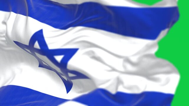 Israeli flag with Star of David waving in wind isolated on green background
