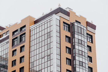 Fototapeta premium large apartment building in winter, purchase of real estate, real estate activity concept