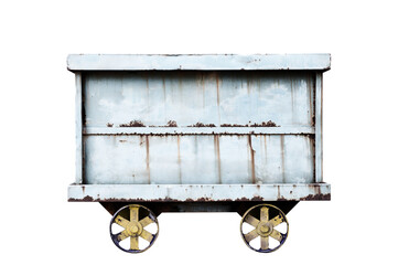 Side view of rusted old mining cart on white background.