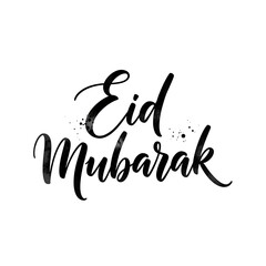 Obraz premium Elegant black brush lettering of eid mubarak for festive greetings and islamic celebrations