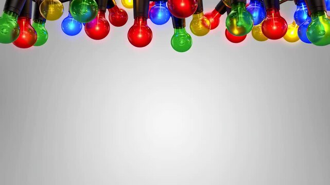 Colorful string lights hanging against a neutral background. Ideal for festive decorations, celebrations, and creating a joyful atmosphere