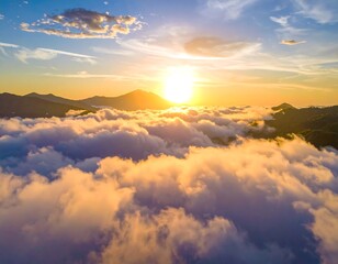 Naklejka premium Golden sunrise over a sea of clouds and mountains.