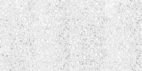 Obraz premium Close up view of a textured white surface with scattered grey details