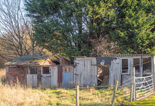 Old dewrelict wooden garage shed at Lower Wincham, Northwich, Chjeshire, UK