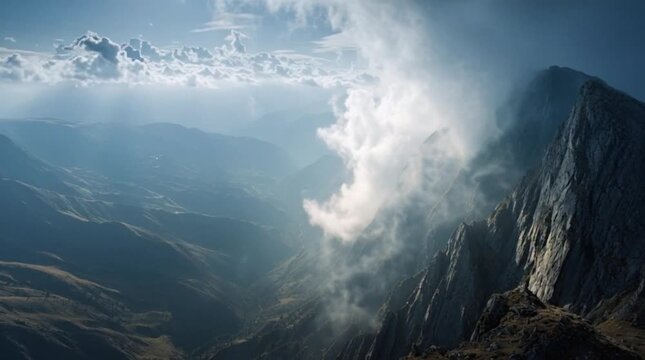 High Angle View of Mountain Valley with Fog and Sunlight Rays