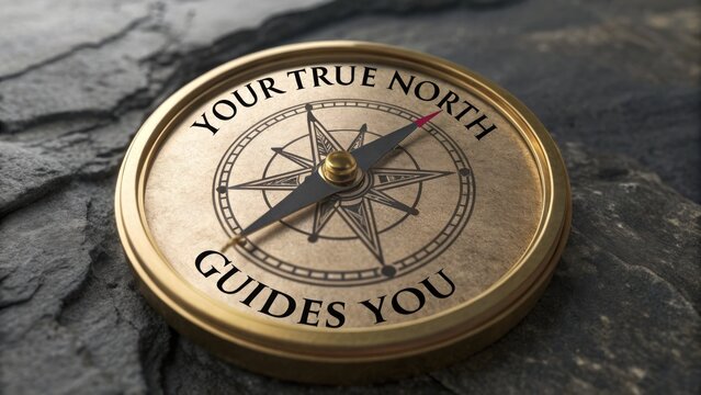 A vintage compass pointing to true north on a dark surface.
