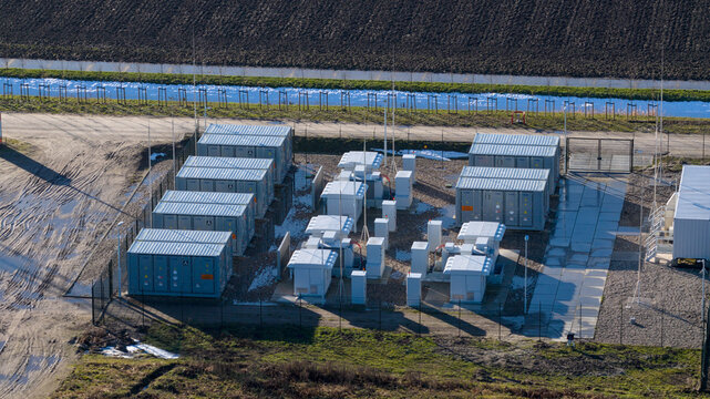 Dronter, Netherlands - 14 January 2026: Aerial view of the Dronter Energy Storage facility, a stark contrast of industrial precision against the backdrop of the surrounding rural landscape.