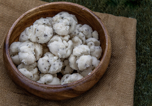 Thai Shortbread Cookies (Thai Dessert), Kanom Kleeb Lum Duen on burlap fabric background.