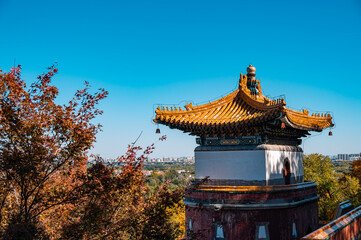 The buildings of the Summer Palace, a Chinese imperial garden in autumn