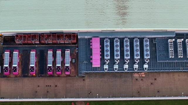Aerial view of Lloyds Horizon Data Centre featuring a variety of cooling systems and other equipment in a structured layout, Corby, United Kingdom.